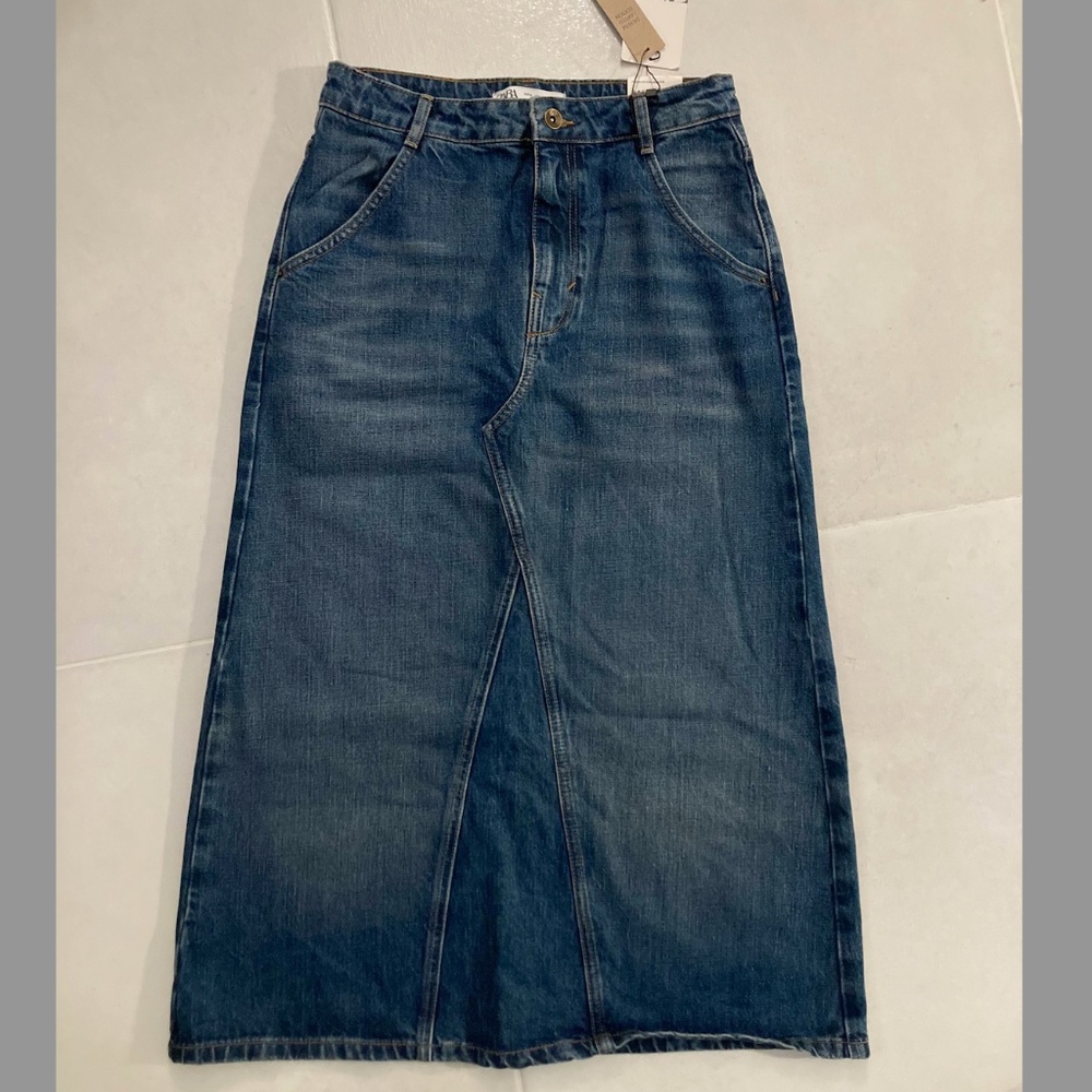 Zara brand long-midi length denim skirt.